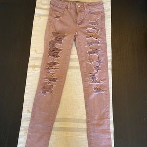 American Eagle outfitters Jeans. Super stretch. Color Mauve. Size 4R